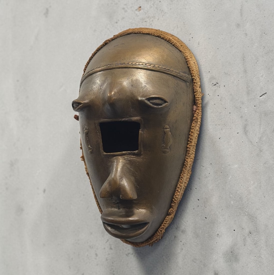 African Bronze Fertility Mask: 8.5" H x 5" W x 3" D.