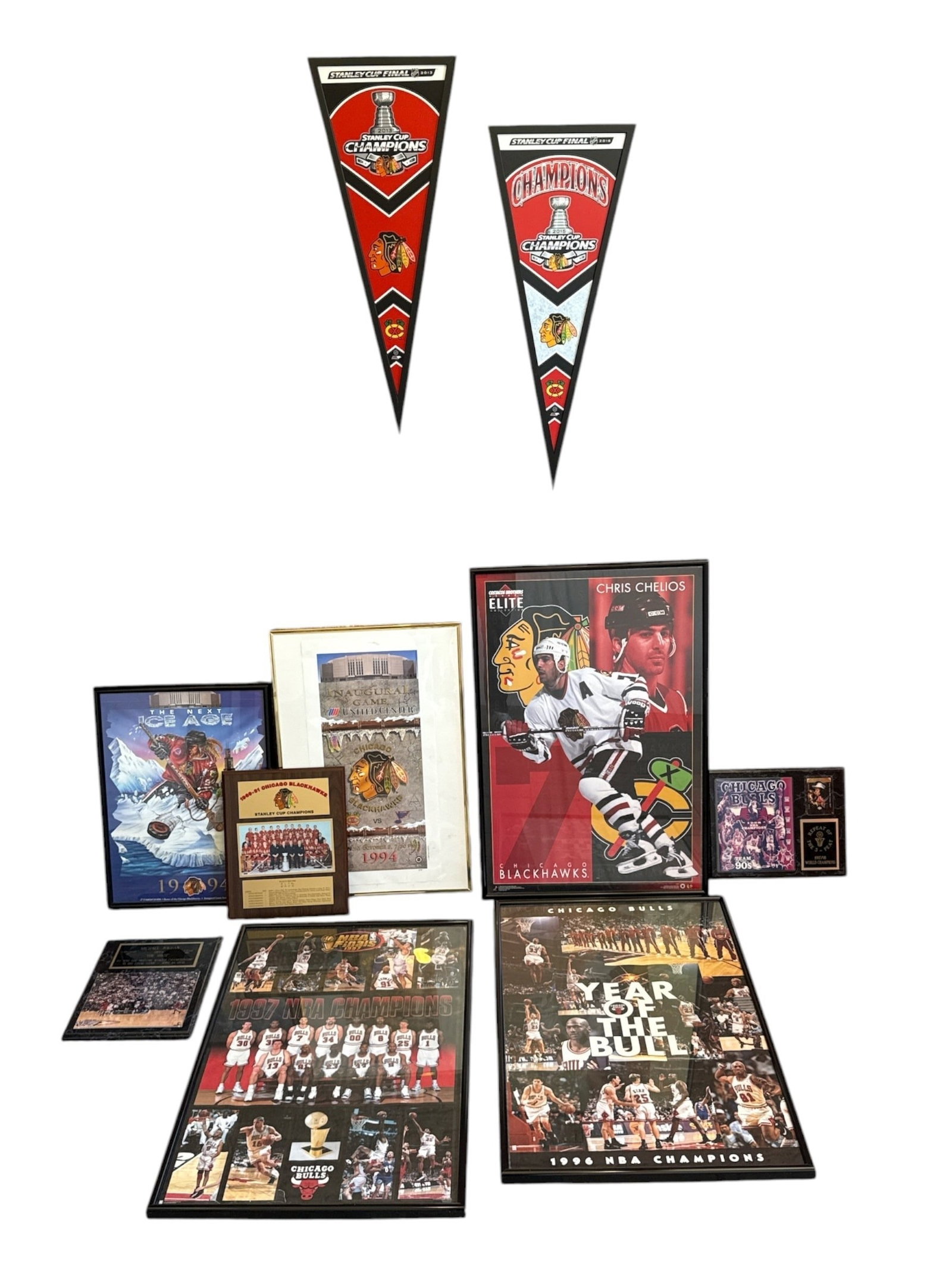 Collection CHICAGO BULLS & BLACKHAWKS Posters / Memorabilia: Includes Michael Jordan memorabilia. Largest piece measures in frame: 36" H x 24" W x .5" D.