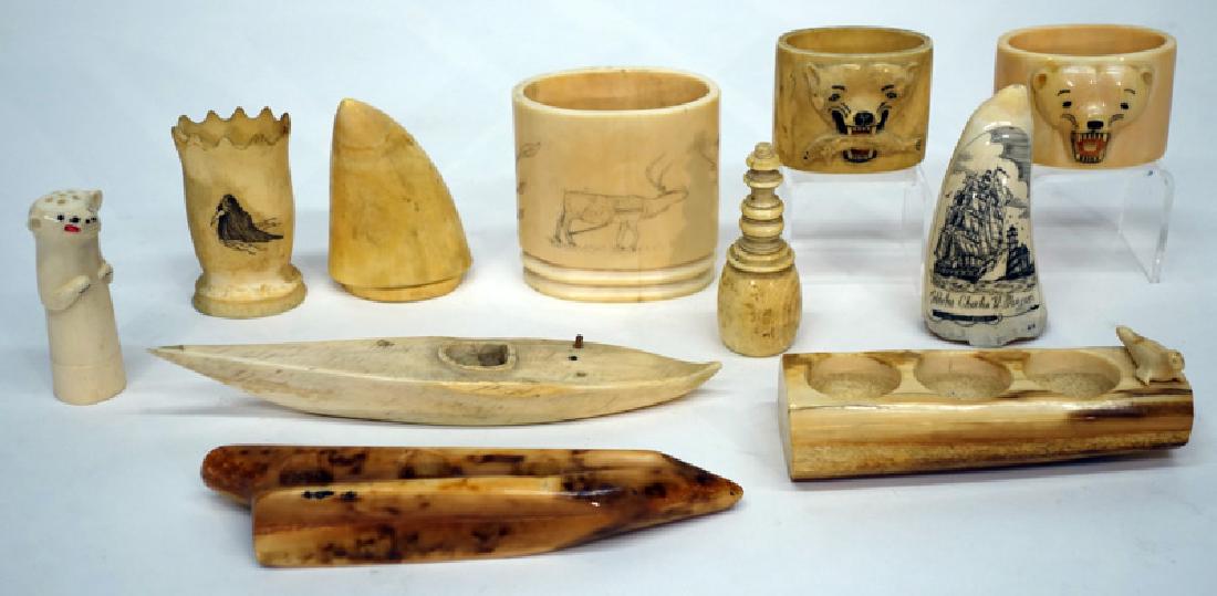 INUIT CARVINGS, SCRIMSHAW, ETC. (11): Napkin rings, kayak, shaker, etc.; kayak L-7", F-G