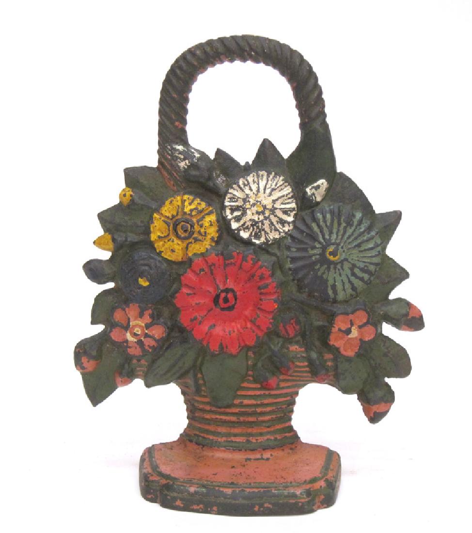 BASKET OF FLOWERS DOORSTOP: Painted cast iron; overall paint loss; H-11", G-VG