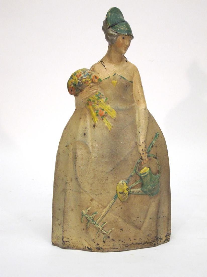 MARY QUITE CONTRARY DOORSTOP: Painted cast iron; overall minor spotting and paint loss; H-15 1/2", G-VG