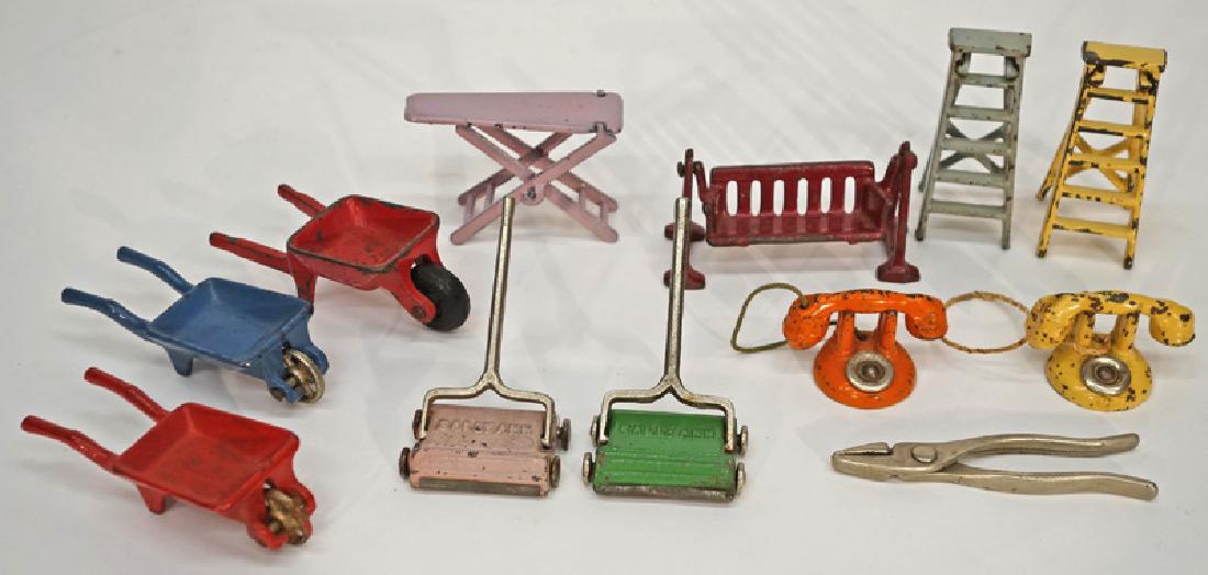 CAST IRON DOLL HOUSE FURNITURE (12) PCS.: Sweepers marked "Sally Ann"; normal wear and paint chips; longest L-4", G-VG