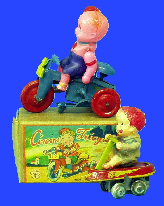 (2) JAPANESE CELLULOID & TIN MECHANICAL TOYS: (1) Circus Tricycle: original box, made in Occupied Japan, NM; (1) Boy on Cart: G. L-3"-4",
