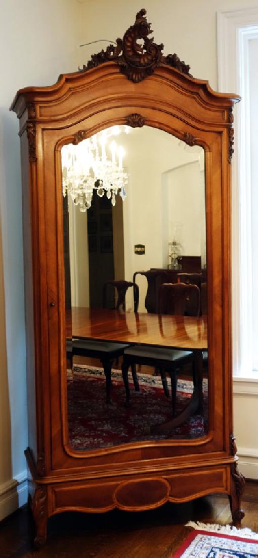 ANTIQUE PROVINCIAL ARMOIRE: Walnut; carved cartouche-shaped beveled mirror; scalloped skirt; minor chips and wear; H-96", W-38", G-VG