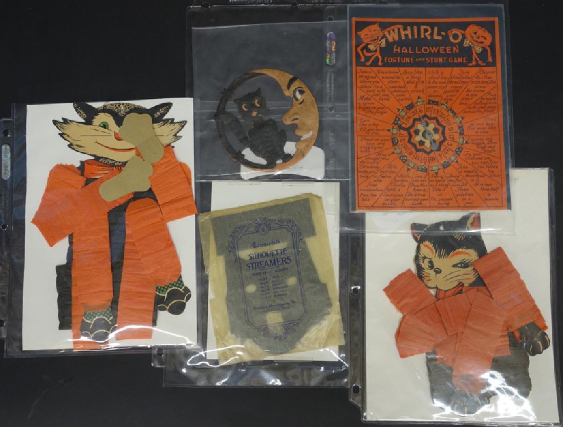 HALLOWEEN ORNAMENTS (5): (2) Honeycomb cat dancers, (1) pack silhouette streamers, (1) die-cut man-in-the-moon, spinner game; tallest H-12", G-VG