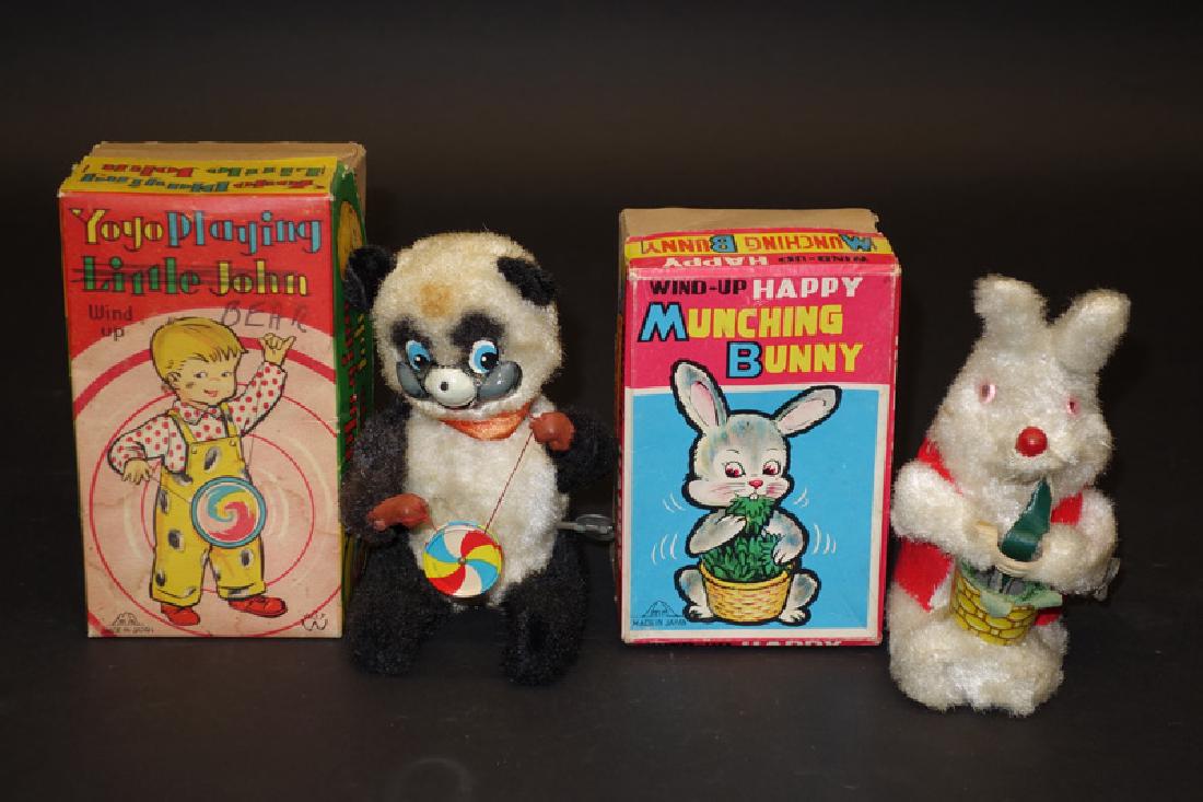JAPANESE PLUSH TOYS (2): M. M., mechanical; (1) Yo Yo Playing Panda: in wrong box, runs but string needs tightening; (1) Munching Bunny: runs but cabbage strap is broken; H-5", G