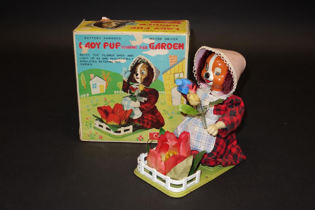 LADY PUP TENDING HER GARDEN (1 of 1)