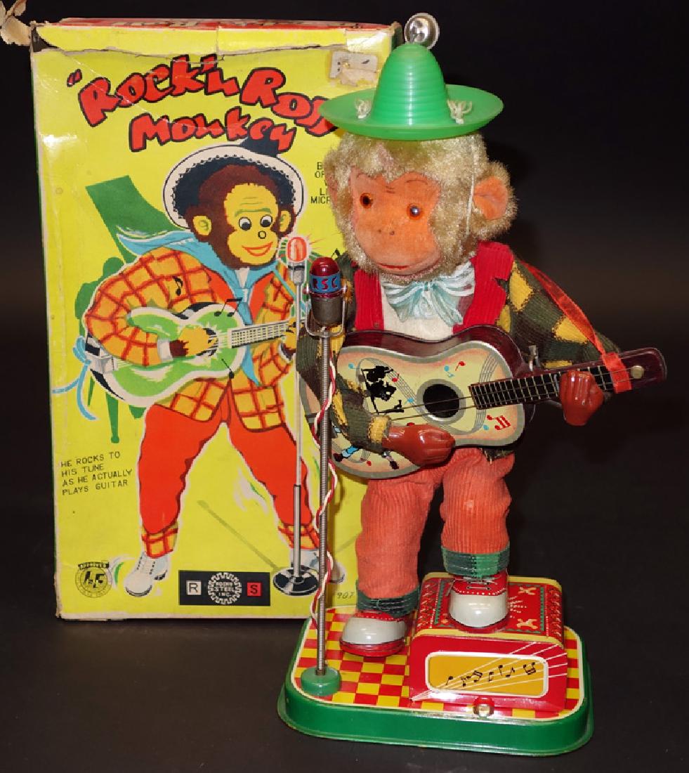 "ROCK 'N ROLL MONKEY" BATTERY OP: Alps Japan; litho tin and cloth; works; original box is torn and worn, box is F-G; H-11 1/2", VG-EX