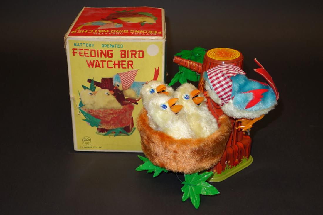 FEEDING BIRD WATCHER (1 of 1)