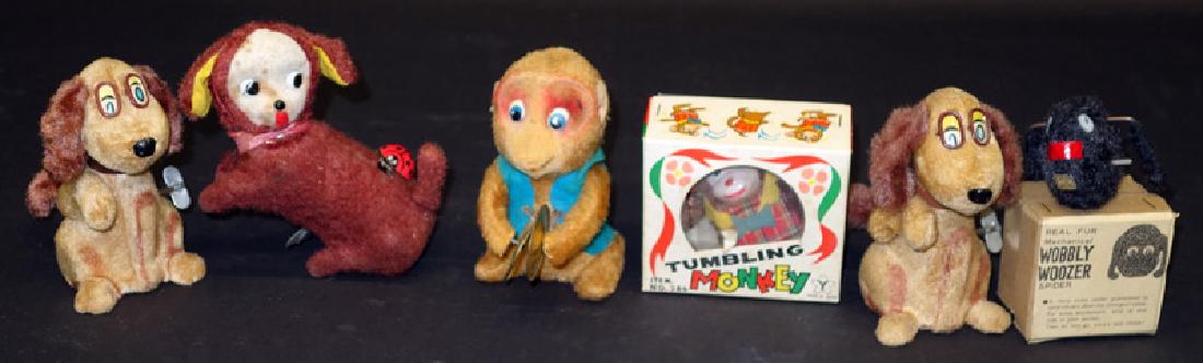 PLUSH ANIMALS (6): Japan (?); mechanical; working; (2) original boxes; wear; longest L-6", F-G