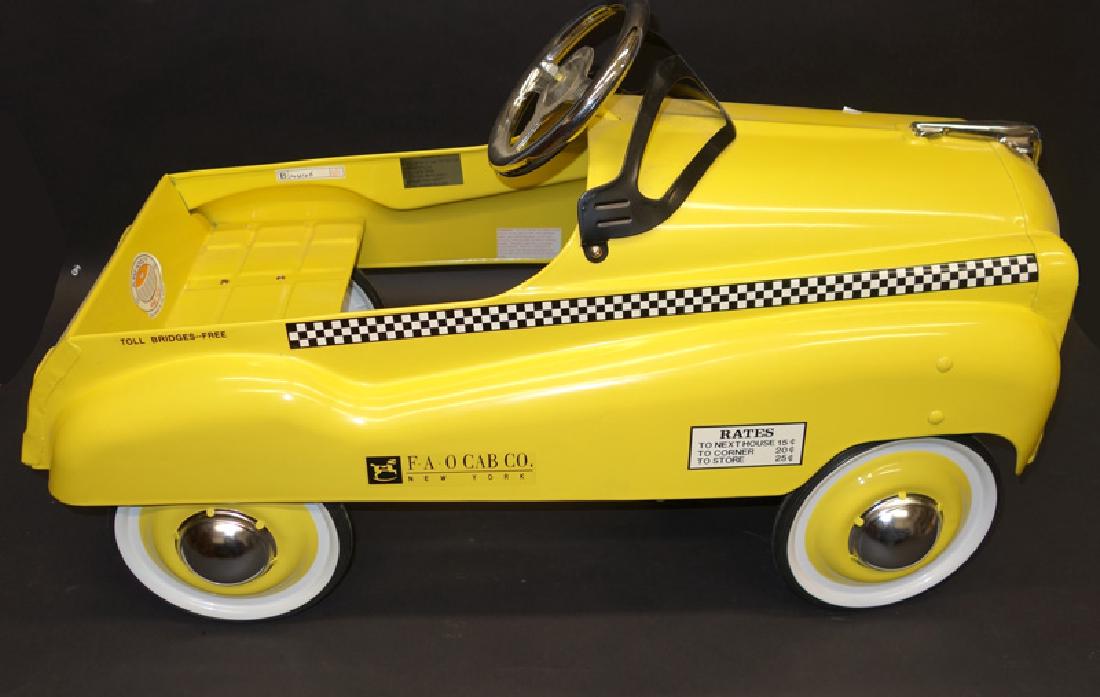 yellow pedal car