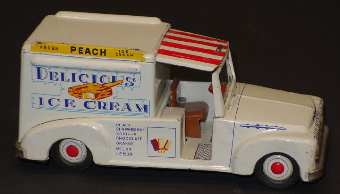 JAPANESE TOY ICE CREAM TRUCK: Litho tin; friction; with bell; normal wear; small back window missing; L-8", G