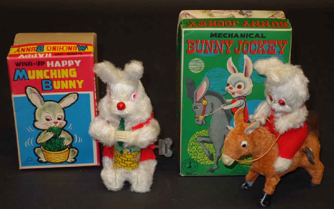 JAPANESE RABBIT TOYS (2): M. M., Japan, plush and tin; mechanial; working, but munching bunny sticks; original boxes are G-VG; H-5"-6", VG-EX