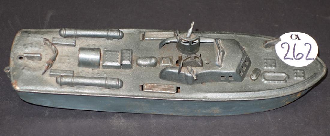 PAINTED TIN WIND-UP GUN BOAT: Mechanical; working; may be missing a small piece (slots visible on deck); normal wear; L-11", G-VG