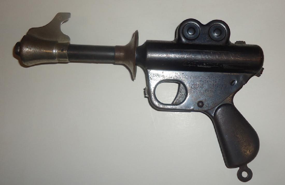 BUCK ROGERS PISTOL: Daisey, sheet metal; pop gun; light surface rust; L-9", F-G