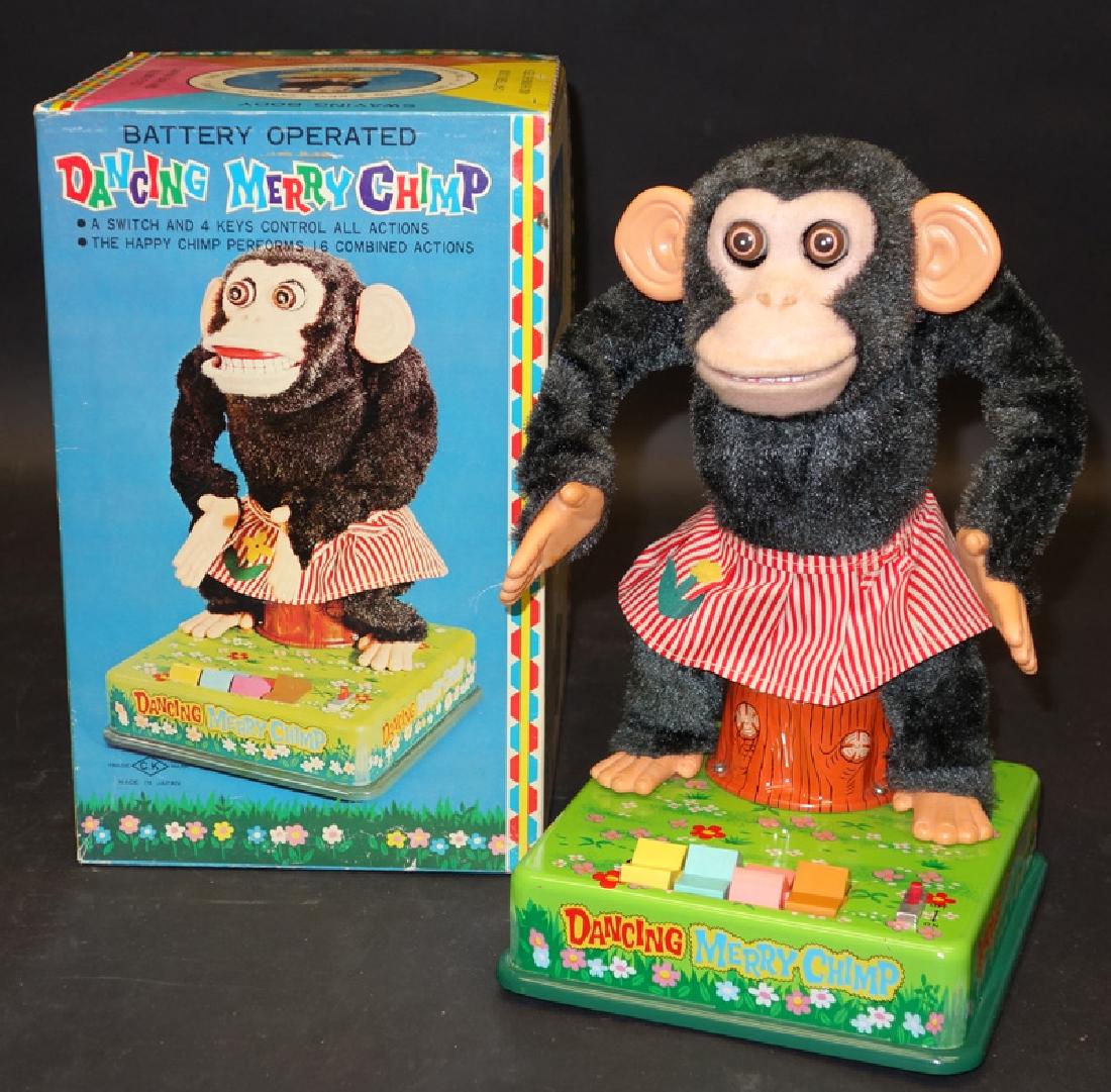 DANCING MERRY CHIMP: CK Japan; litho tin, plush and cloth; battery op working; original box is G-VG; normal wear; H-11 1/2", G-VG