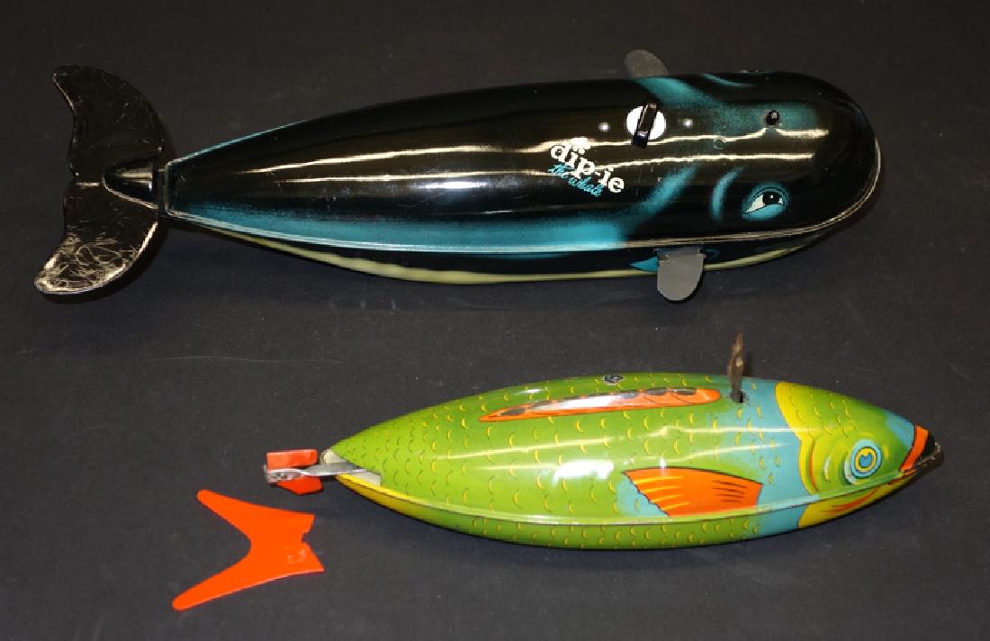 FISH & WHALE TOYS (2): Litho tin; (1) whale: Japan; battery op; not working; (1) Swimming fish: mechanical; working; tail broken; normal wear; L-9 1/2" - 13", G-VG