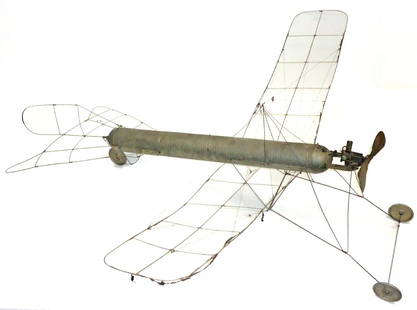 RARE BING AIRPLANE: Tin and wire; has Bing label; advertisement reads: "Neuester Modell-Flugapparat 'Autoplan' mit Drukluft-Motor" (compressed air motor); wear; H-18", L-50"