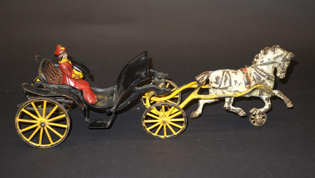 WILKINS PHAETON: Painted cast iron; original paint; original figure with touch-up; paint chips; paint losses and wear; L-15", F-G