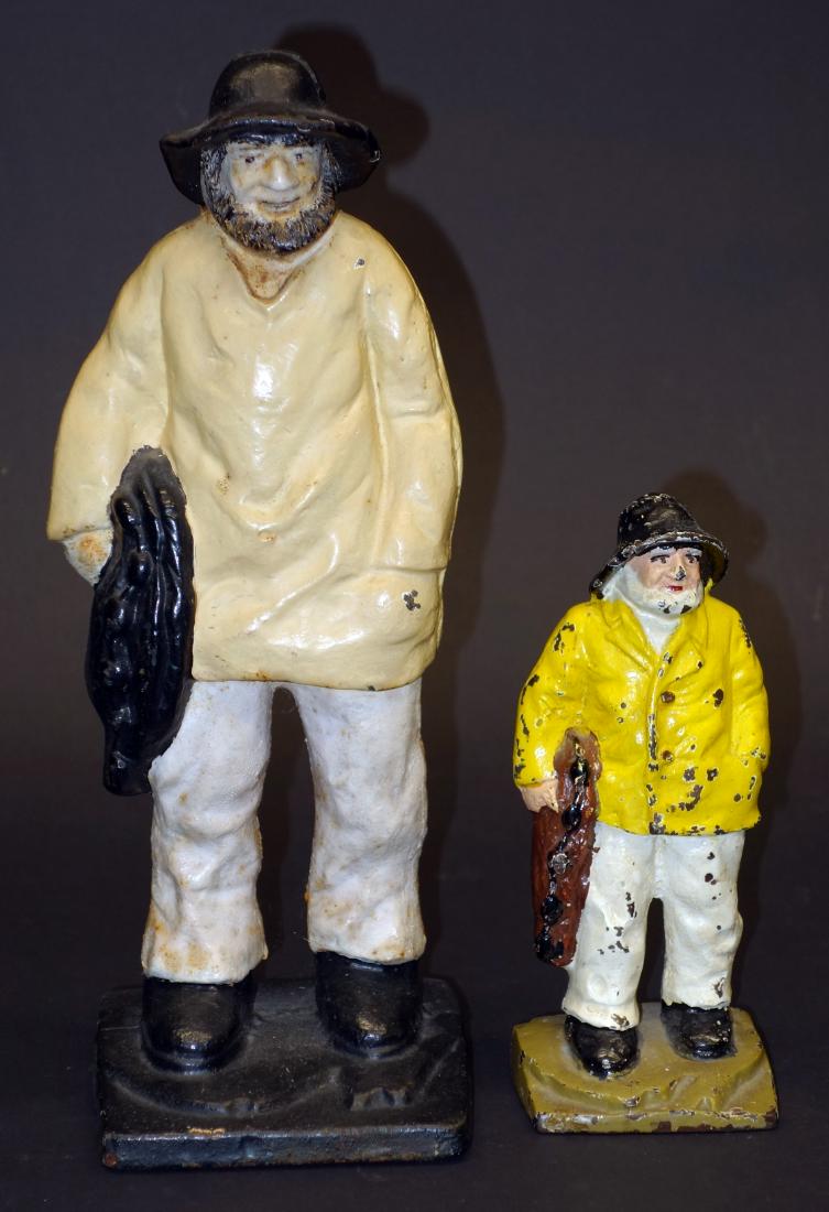 OLD SALT DOORSTOPS - (2): Painted cast iron; larger repainted, wear and chips; h-7"-11"; F-G