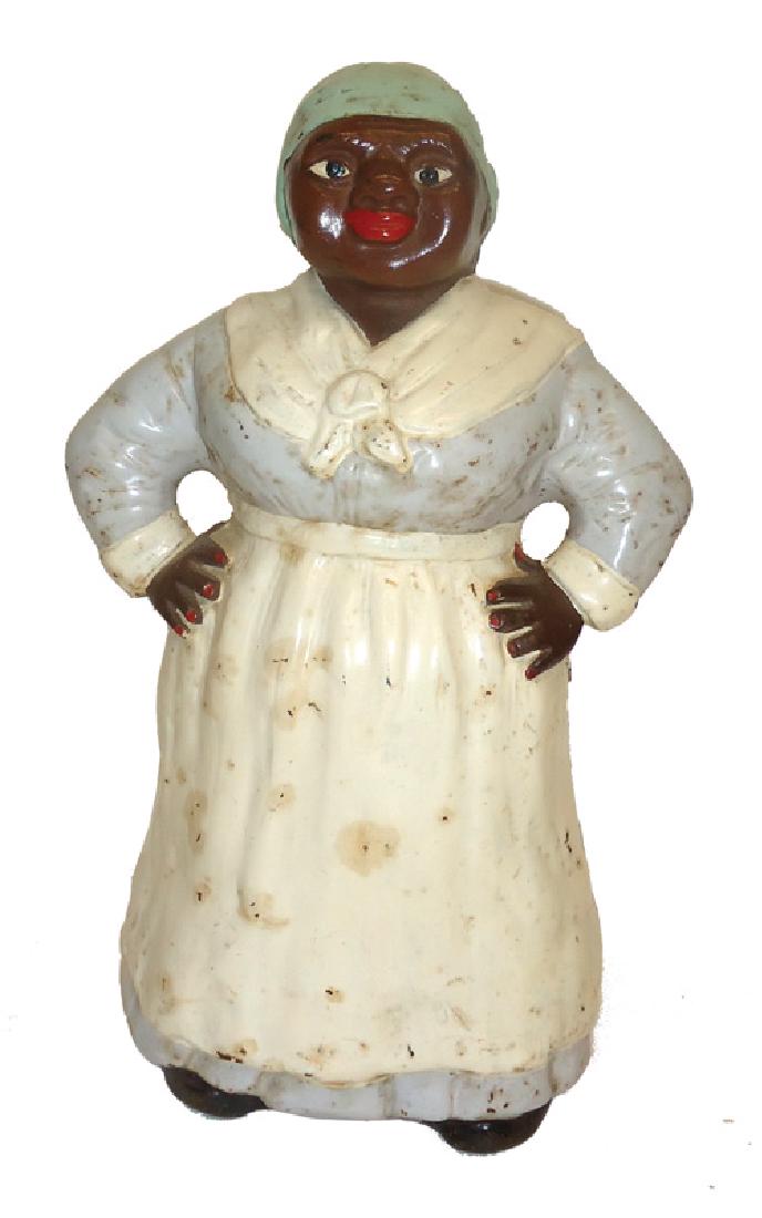 MAMMY DOORSTOP - HUBLEY: Painted cast iron; rust spots and blemishes; H-12"; G
