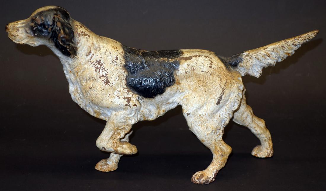ENGLISH SETTER DOORSTOP: Painted cast iron; paint wear, some rust spots and paint chips; L-15 1/2"; F-G