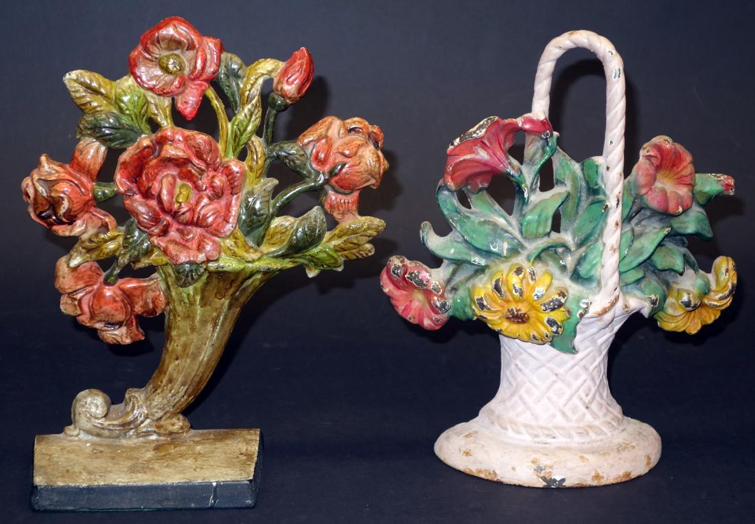 BASKETS OF FLOWERS DOORSTOPS: Painted cast iron, repainted; H-10"; F-G