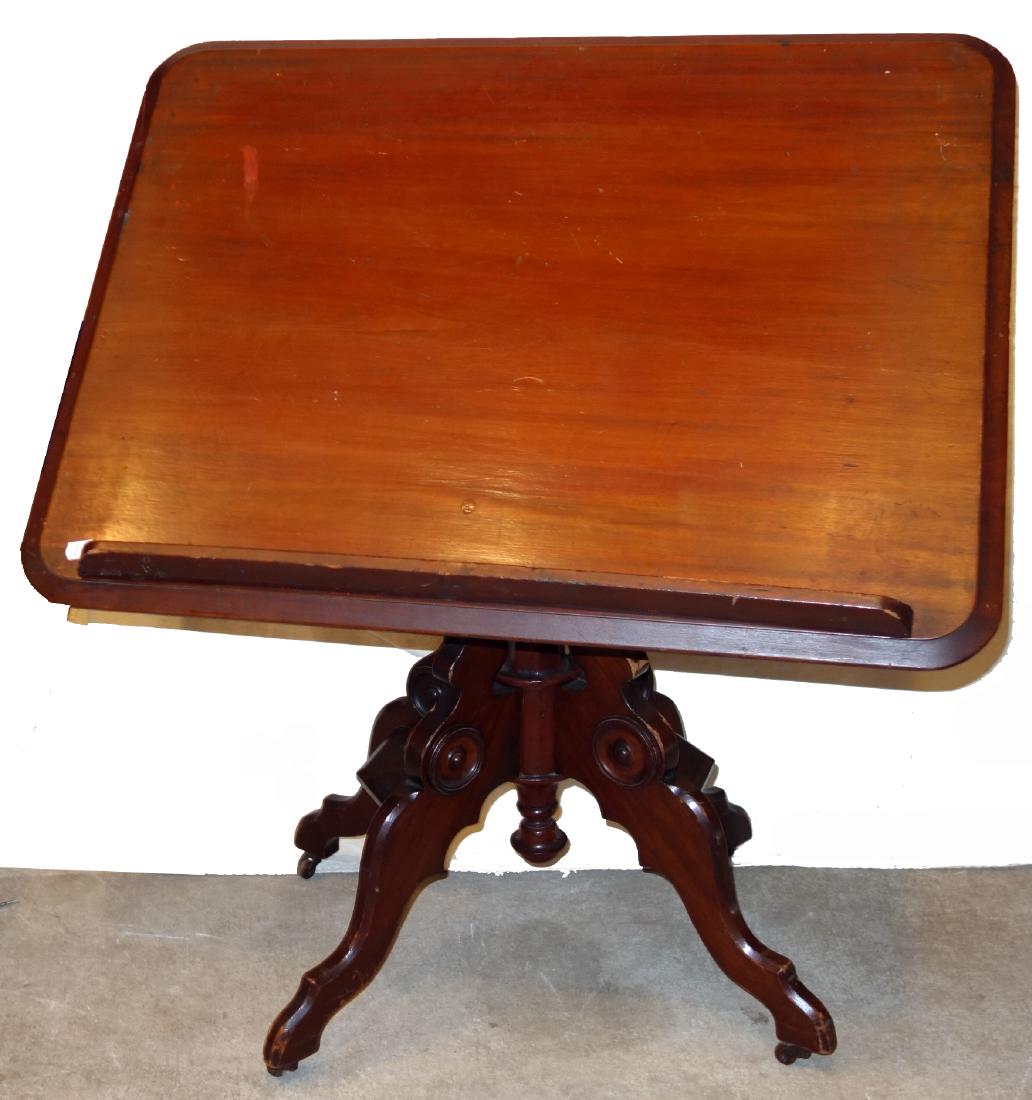 VICTORIAN DRAFTING TABLE-MAHOGANY: Unusual folding pedestal; locking tilt and telescoping mechanism; (1) drawer; normal wear; L-31"; G-VG