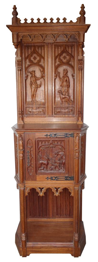 CONTINENTAL COURT CUPBOARD: Elaborately carved mahongany; gothic designs with "Fauconnier" and "Chatelaine" in top panels; lower door carved hunt scene; gothic carving throughout; refinished; normal wear; minor losses; H-86", W-