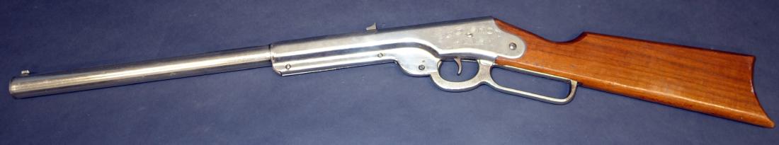 DAISEY 1905 BB GUN: 500 shot; chrome and wood; L-32", VG-EX