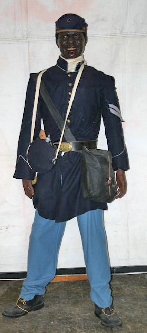 BLACK CIVIL WAR UNION SOLDIER WAX FIGURE: Fully dressed in replica outfit, "Benton Calhoun", H-approx. 66"Back of the head of this figure is marked P. Imans - Paris - 6807-66?A kind bidder informed us that this piece is by Pierre Imans, circa