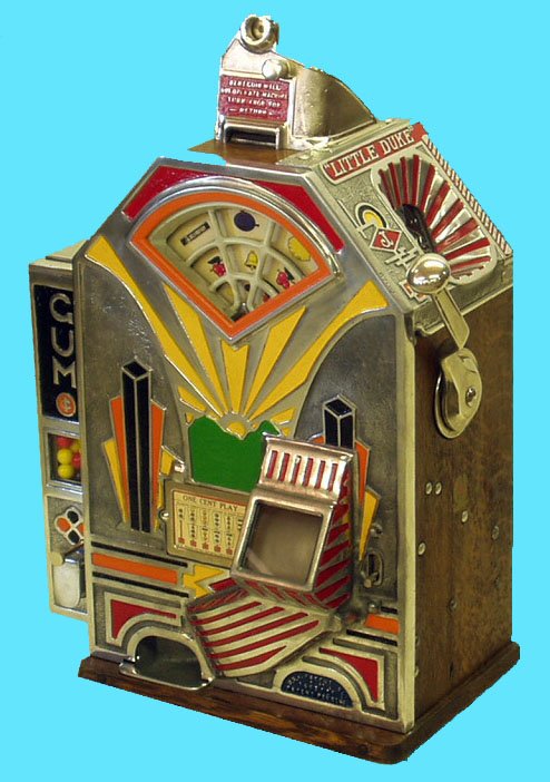 JENNINGS "LITTLE DUKE" SLOT MACHINE: 1 Cent with vendor; working; nickel-plated and painted cast metal front with oak sides; 1932; partially restored; H-25", W-18", VG.