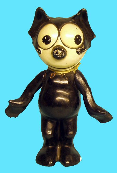 FELIX THE CAT COMPOSITION FIGURE: Jointed arms; remnant of chest label; crazing and lifting at head and torso seams; face rubs; H-13", F-G.