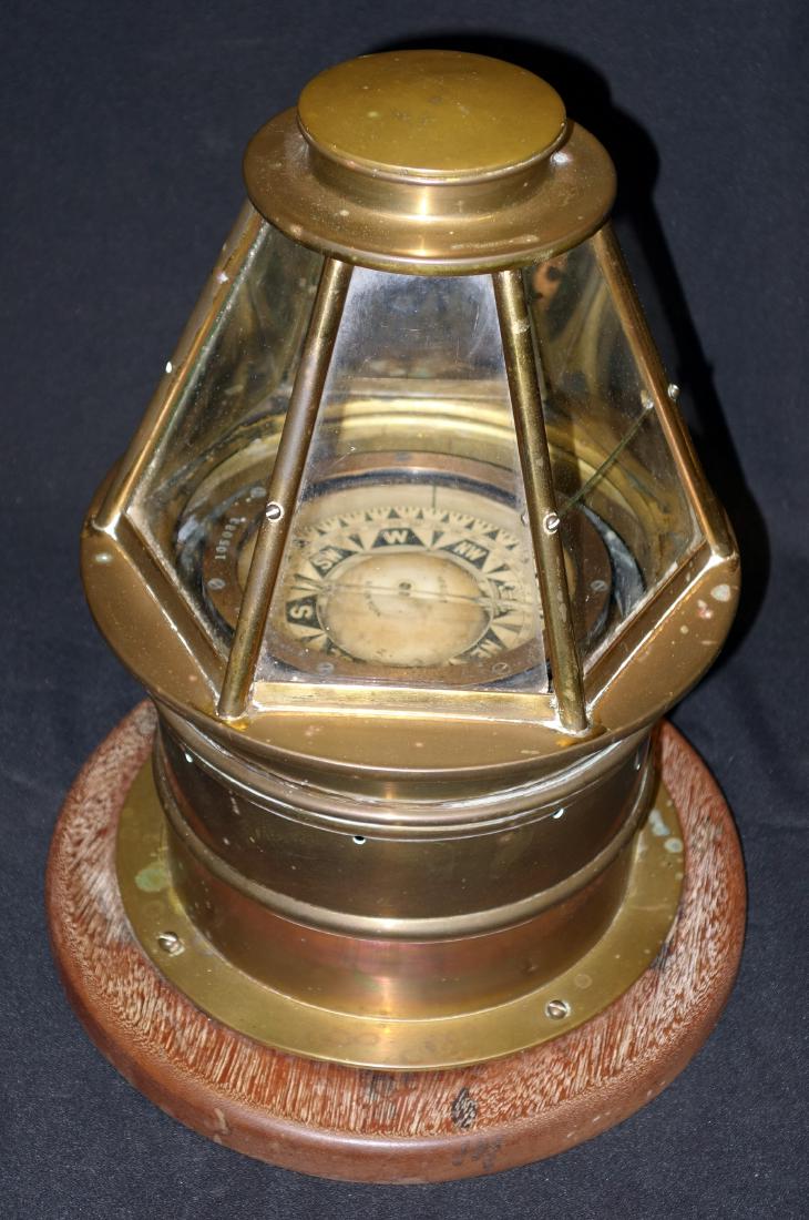 RITCHIE BOSTON SHIP'S COMPASS: Brass on wood base; six sided glass tapered top; (1) glass cracked; normal wear; H-15", G