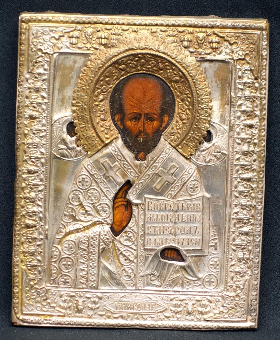 ICON- ST NICHOLAS WONDERWORKER: Russian; 19th century; painted on wood with tin rizer; normal wear; 9" x 7"; G