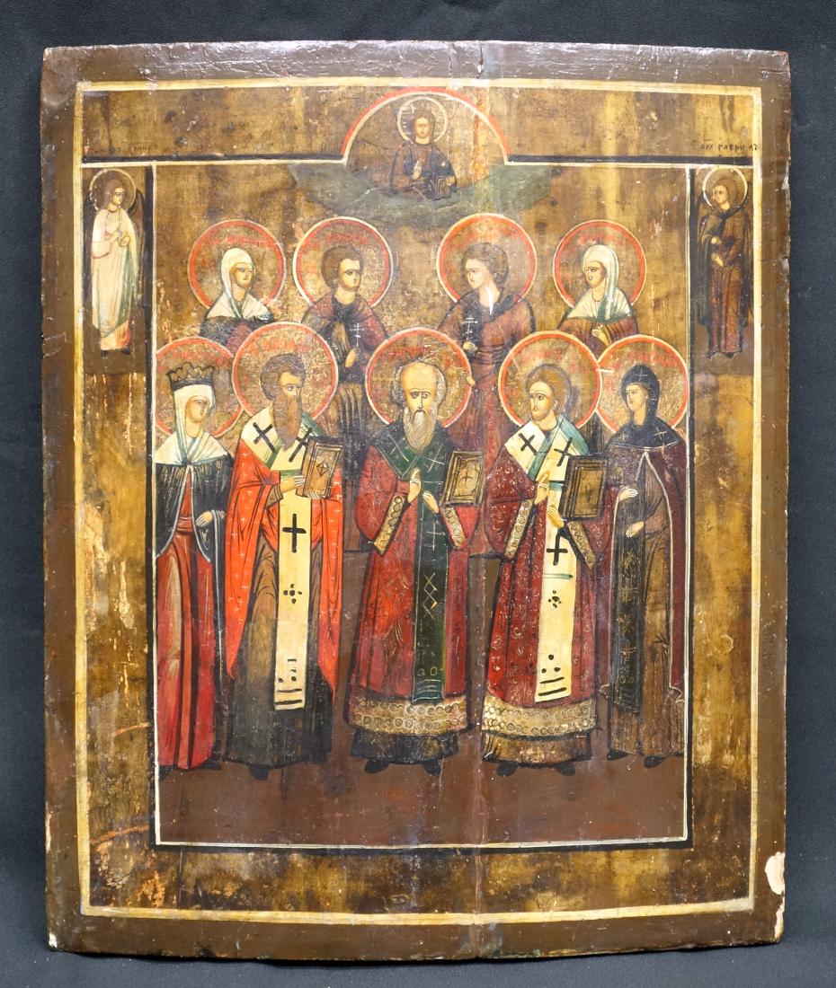 ICON: Saints Basil, John, Chrysastom, Gregory surrounded by other saints; Russian; 19th century; painted on wood; wear; some restoration; warping; crazing; 16" x 13"' G