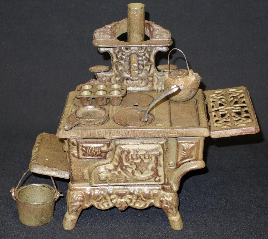 CRESCENT STOVE: Painted cast iron; heavier than normal; normal wear; L-9", G