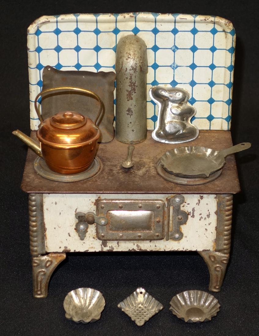 EARLY SMALL TIN TOY STOVES (3) (1 of 3)