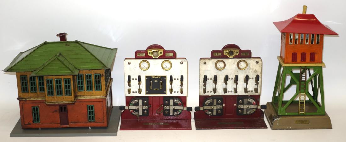 LIONEL ACCEESSORIES (4): Painted metal; (2) panel boards - 440C; (1) signal tower $38; (1) station with panel board on back; wear; tallest H-11 1/2", P-G