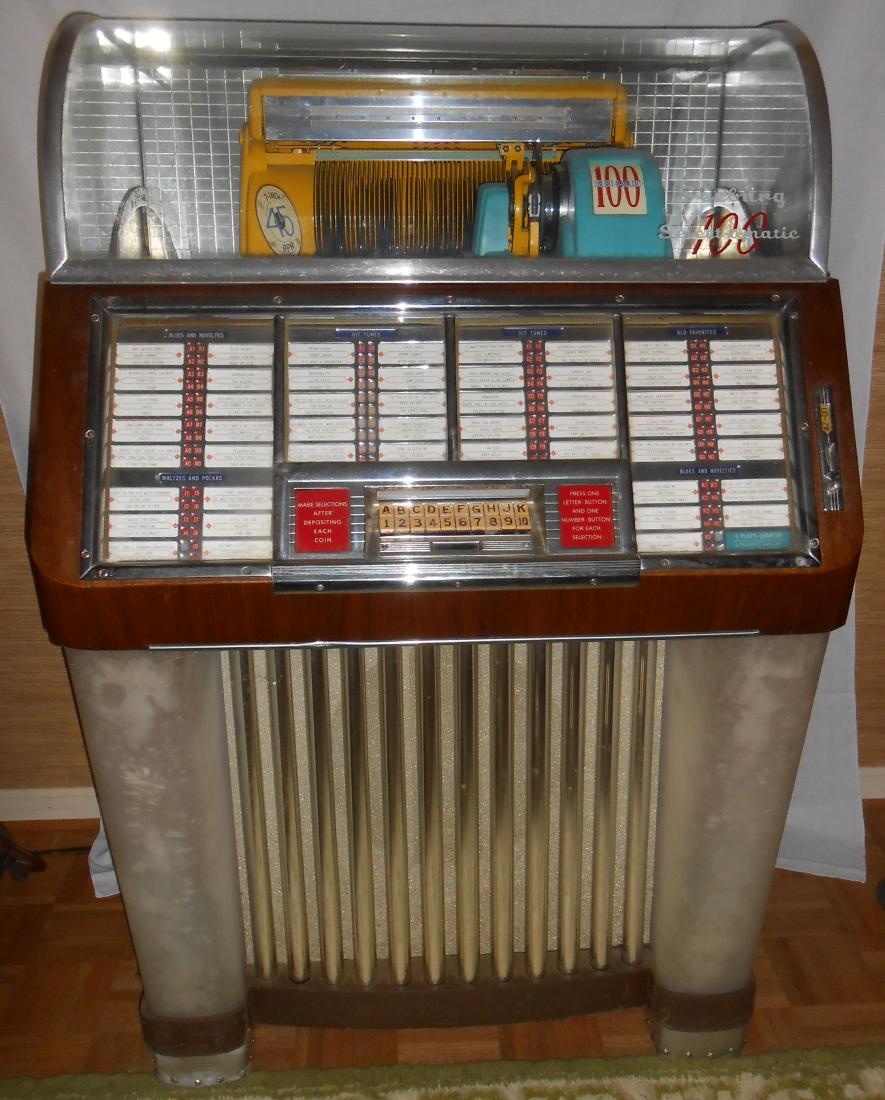 SEEBURG SELECT-O-MATIC JUKEBOX: 100 Selection; curved glass; walnut sides; needs cleaning; H-53", W-36", G-VG
