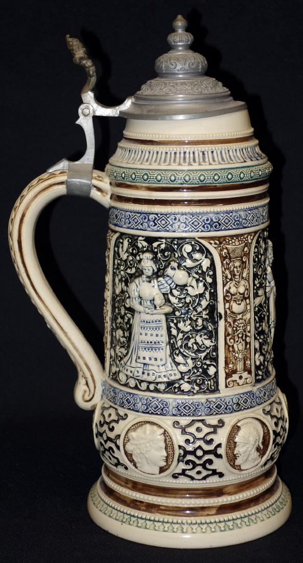 TANKARD STEIN #703: German, ceramic relief decoration; normal wear; spider in bottom; H-15", G