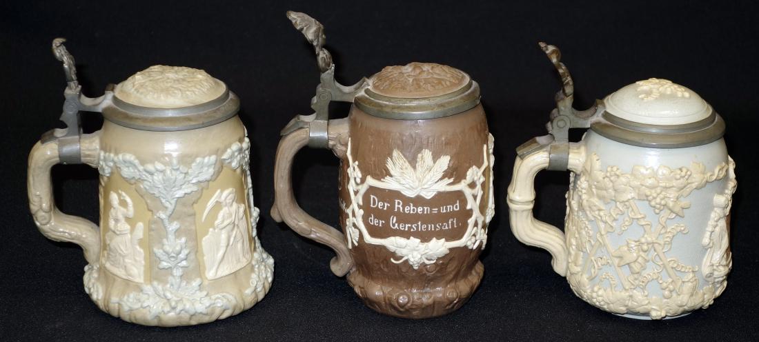 METTLACH CAMEO STEINS (3): Villeroy & Boch, green mark; ceramic with relief decoration; #1028, 1370, 1467; normal wear; H-6"-7", G-VG