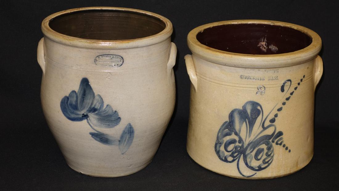 STONEWARE CROCKS (2): Blue decorated flowers; two gallons; (1) Frank Norton-Worcester Mass; (1) A. E. Smith, NY; H-9 1/2"-11", VG-EX