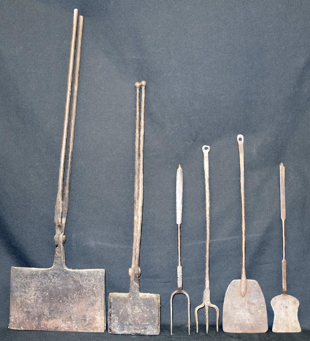 WROUGHT IRON UTENSILS: (2) waffle irons; (2) forks, (2) peels (?); wear; longest L-35", F-G