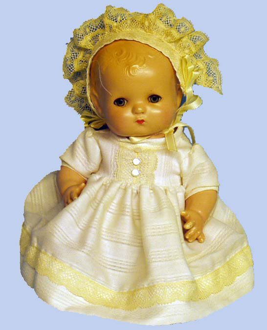 EFFANBEE PATSY BABY COMPOSITION DOLL: EFFANBEE PATSY BABY - "Effanbee Patsy Baby" composition, generally good condition, some finger rubs; redressed. H-9 1/2". VG