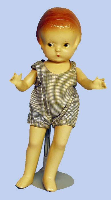 EFFANBEE PATSY JR. COMPOSITION DOLL: EFFANBEE PATSY JR. - Composition, mild crazing overall; split on head seams; appropriate outfit. H-11", G