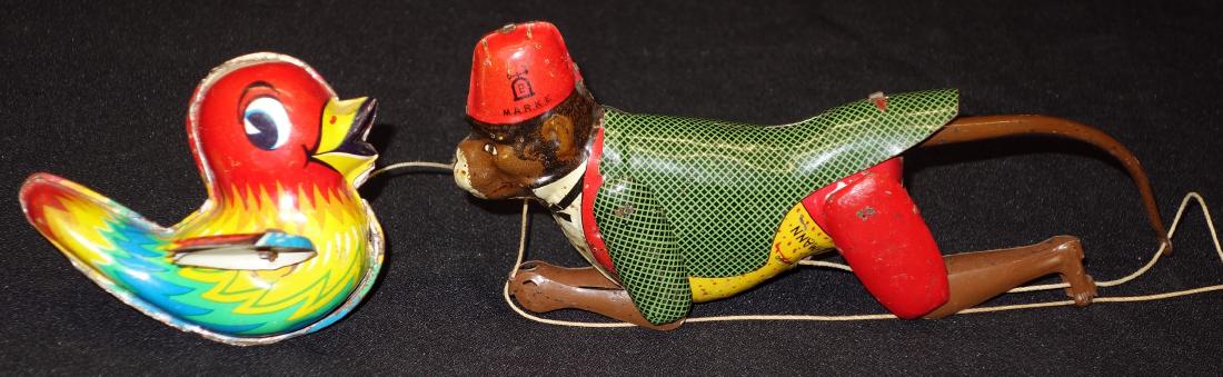 LEHMANN TOYS (2): Litho tin; pull string; (1) climbing monkey, working; (1) Loli, works sporadically; wear; tallest H-9", F-G