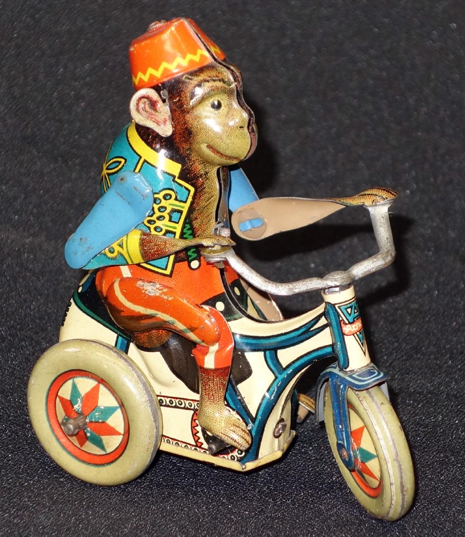 MONKEY TRICYCLE: Arnold; West German; litho tin; mechanical; working; normal wear; L-3 1/2", G-VG