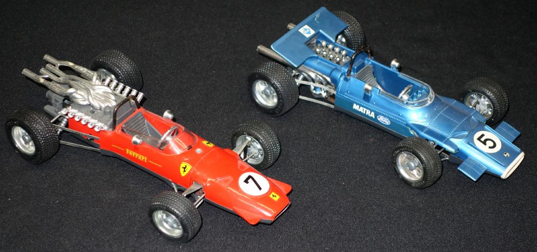 SCHUCO FORMULA CARS (2): Plastic, metal, etc.; mechanical; runs; (1) Ferrari #1073, missing stabilizer flap; (1) Matra Ford 1074, normal wear; L-9", G-VG