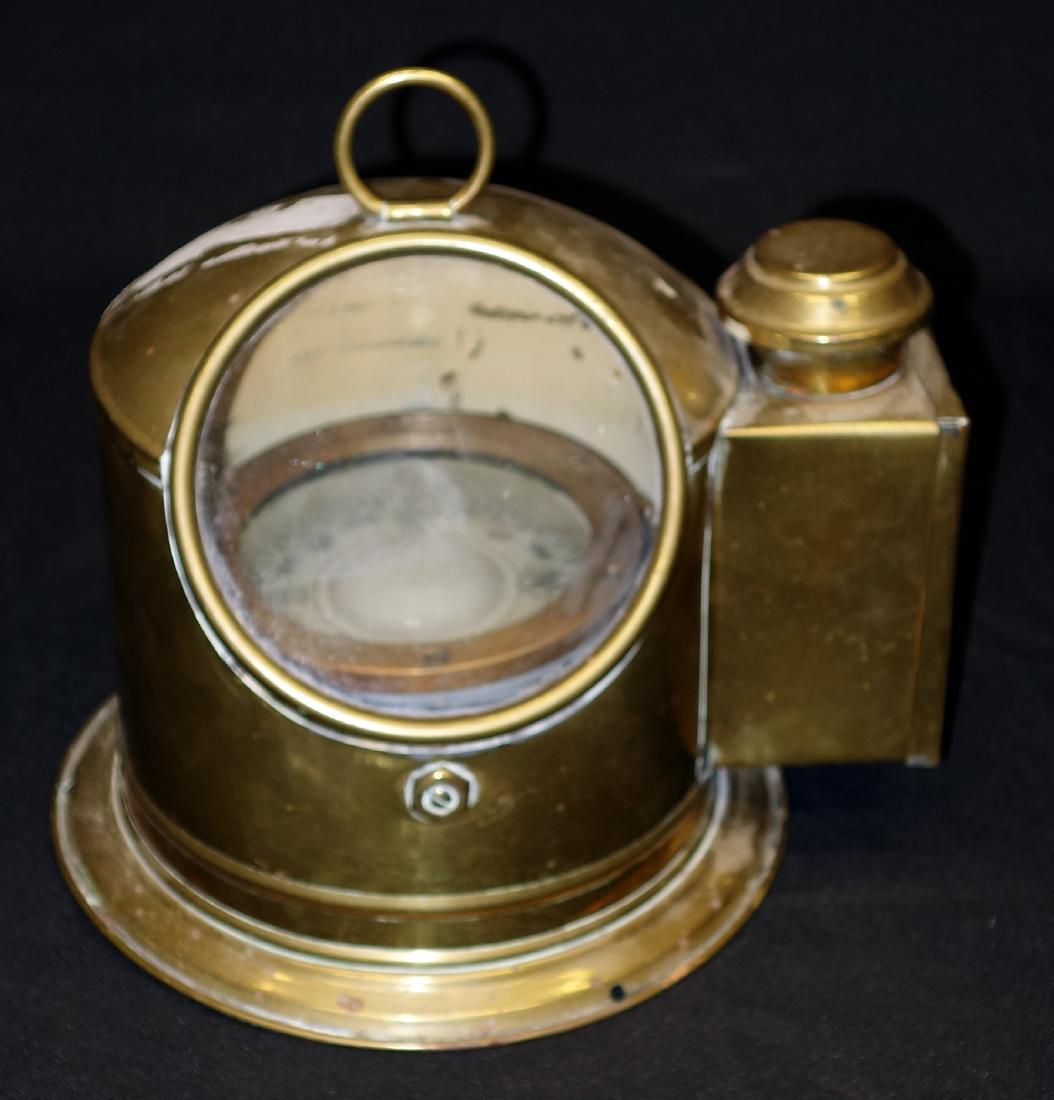 SHIP'S COMPASS: Brass case, has lantern; normal wear; H-10", G-VG